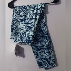 Nike Swirl Pattern Leggings In Two Tone Blues.